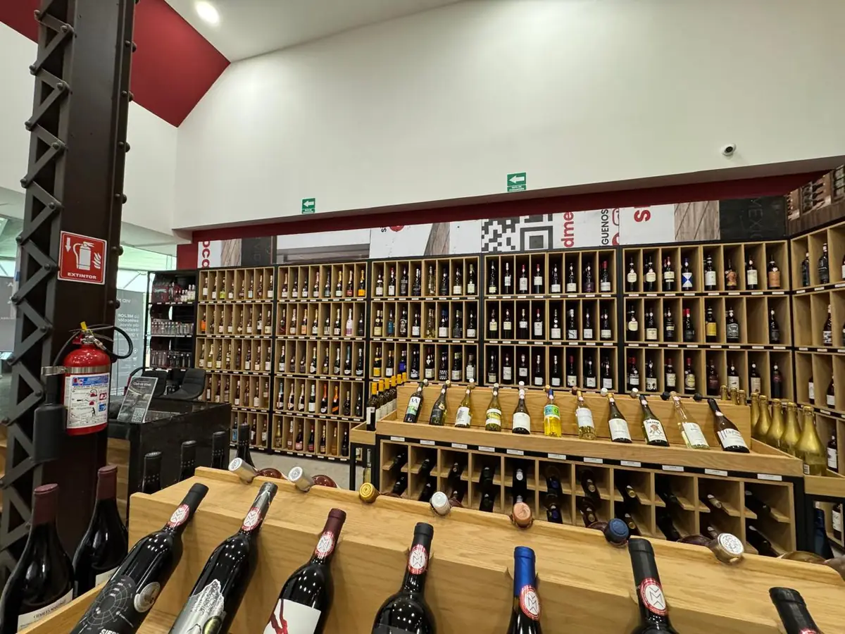 Shelves lined with Mexican wine bottles at a Vid Mexicana store